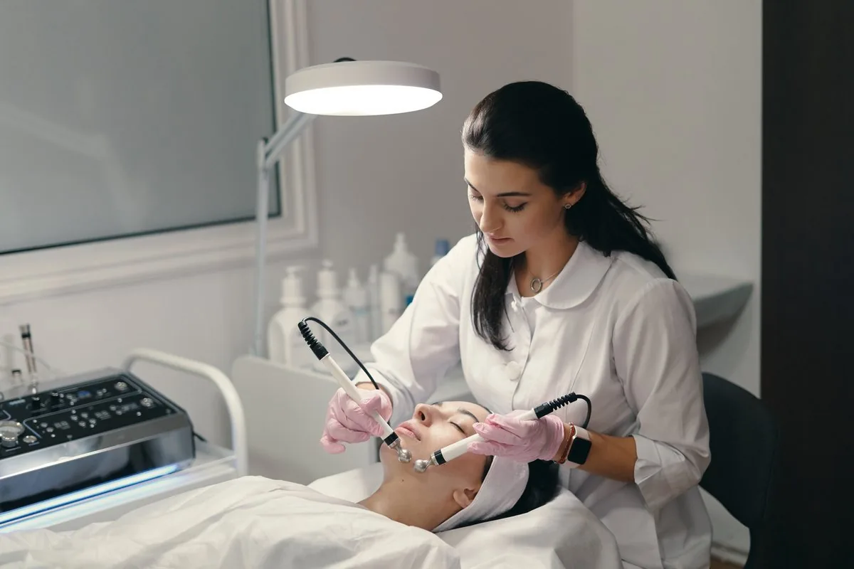 Aesthetic practitioner performing a skin treatment